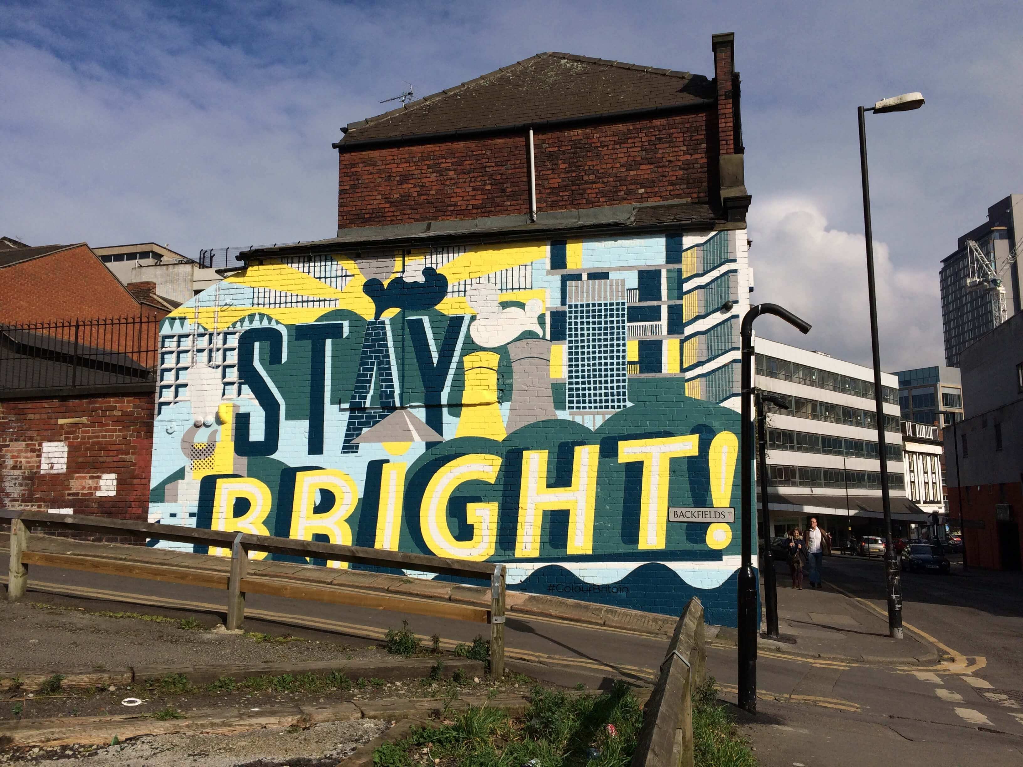 Student Graphiti wall, says 'Stay Bright'